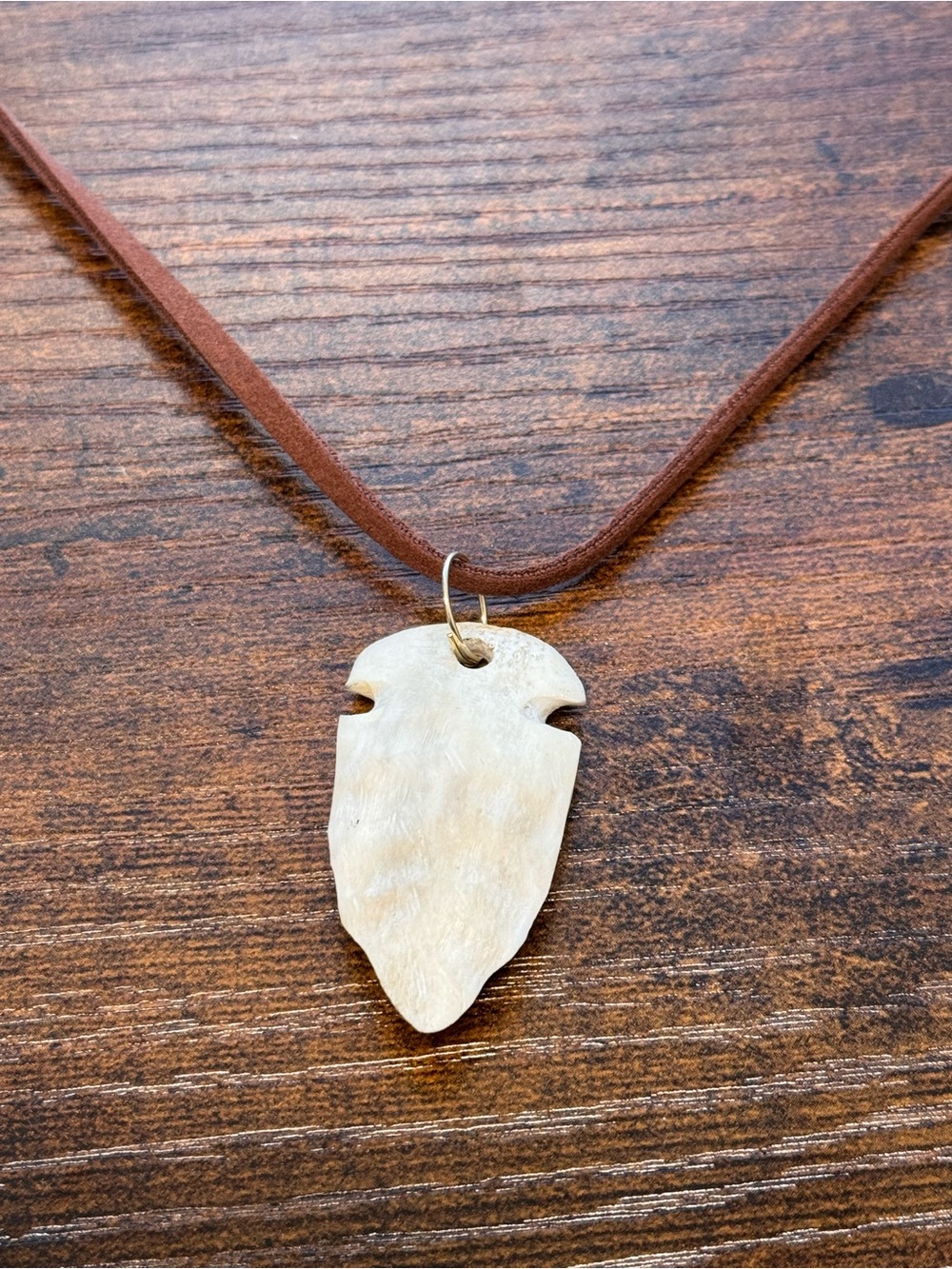 Handcrafted Ivory-Tone Deer Antler Arrowhead Pendant Necklace - Brown Cord